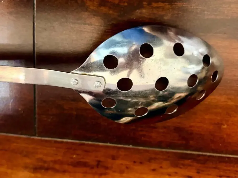 Vintage Stainless Steel Slotted Serving Spoon with Wooden Handle, Made in Japan